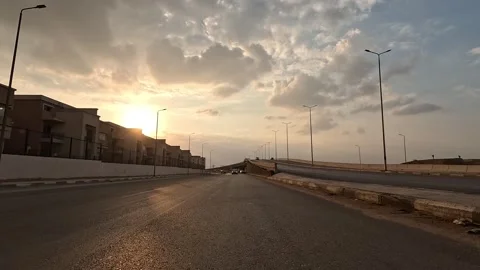 Driving Through Open Streets New Cairo Showing Modern Buildings Traffic And Stock Footage 329894794