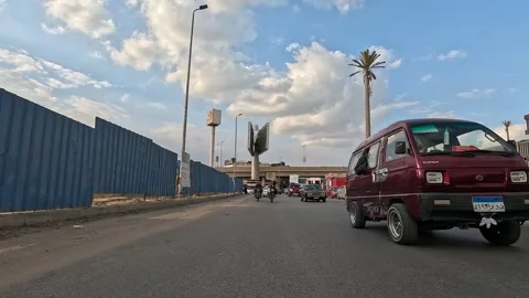 Driving Through Open Streets New Cairo Showing Modern Buildings Traffic And Stock Footage 329951489