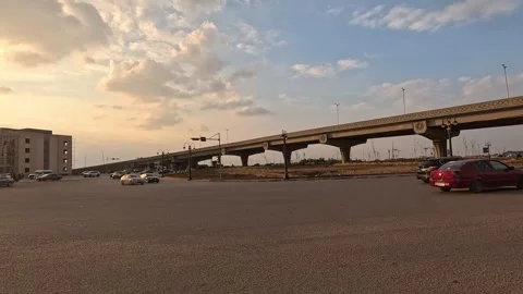 Driving Through Open Urban District Streets New Cairo Showing Buildings Traffic Stock Footage 329887579
