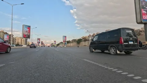 Driving Through Open Urban District Streets New Cairo Showing Buildings Traffic Stock-Footage 329949049