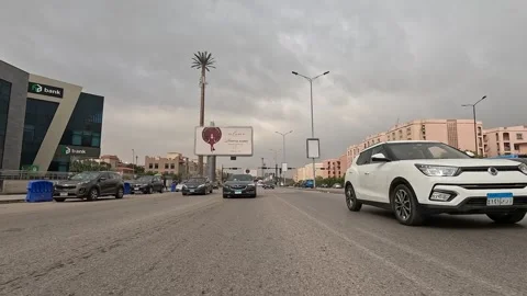 Driving Through Open Urban Residential Streets New Cairo Showing Buildings Stock Footage 330110477