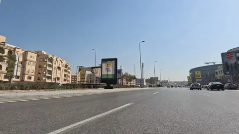 Driving Through Orderly City District Roads New Cairo Showing Buildings Traffic Stock Footage 329805288