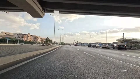 Driving Through Orderly Streets New Cairo Showing Modern Buildings Traffic And Stock Footage 329657363