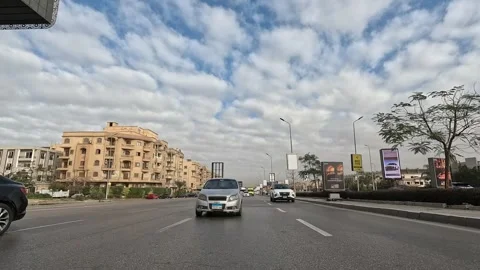 Driving Through Organized Streets New Cairo Showing Modern Buildings Traffic And Видео 329701769
