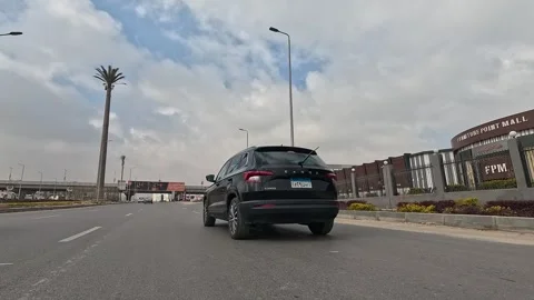 Driving Through Planned Modern Urban District New Cairo Showing Buildings Stock-Footage 330108477