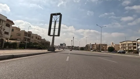 Driving Through Planned Modern Urban District New Cairo Showing Buildings Stock Footage 330114417