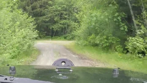 Driving through puddle and big splash Stock Footage 173352528