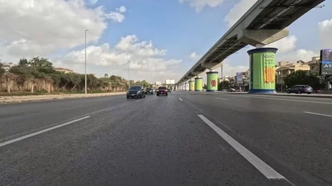 Driving Through Quiet Urban Roads New Cairo Showing Buildings Traffic Vehicles Stock Footage 329659529