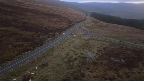 Driving Through a Remote Mountain Pass and Rugged Landscape of County Wicklow Stock-Footage 330990815
