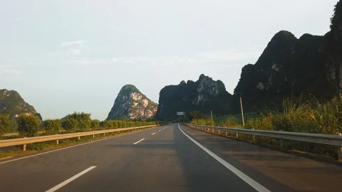 Driving through rice fields and karst rocks in Guangxi province, China 스톡 동영상 114812489