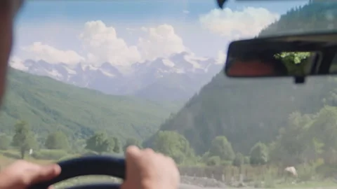 Driving through scenic mountain roads in breathtaking landscapes Vidéo 301401807