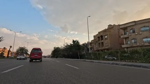 Driving Through Serene Urban District Roads New Cairo Showing Buildings Traffic Stock Footage 329898126