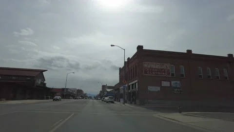 Driving through a small town 4k Stock Footage 167570403