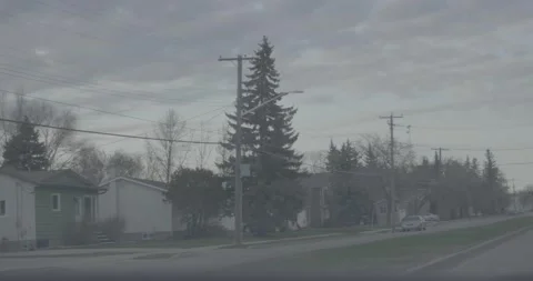 Driving through a small town in the evening Stock Footage 146807347