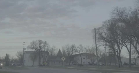Driving through a small town in the evening Stock Footage 146807541