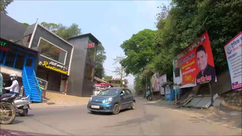 Driving through small town in India, time lapse Vídeos de archivo 255657387