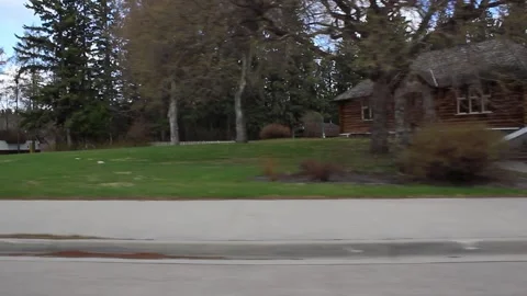 Driving through a small town suburbs Stock-Footage 146615696