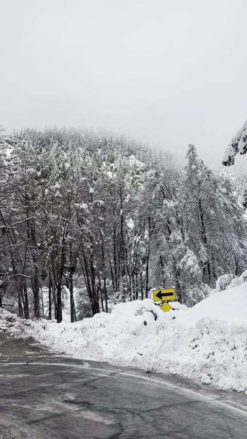Driving Through Snow Covered Mountain Road Vídeo Stock 263930067
