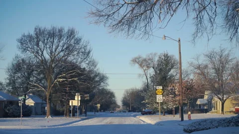 Driving through Snowy Small Town Vídeo Stock 146678474