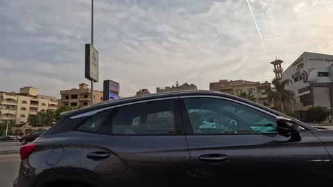 Driving Through Spacious Urban District Roads New Cairo Showing Buildings Stock Footage 329773840