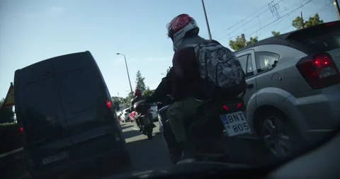 Driving Through Streets In Athens Greece Motorcycles passing - October 13, 2019 Stock Footage 337803656