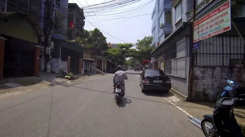 Driving through the streets of Halong Bay 스톡 동영상 75886928