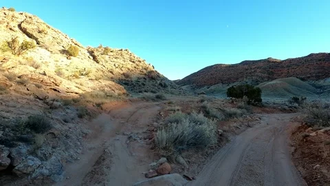 Driving Through the Stunning Cache Valley Wash, Moab Utah, at Sunset Video stock 261032793