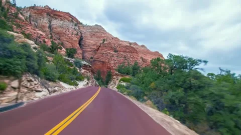 Driving through the stunning red rock canyons of Zion National Park, Utah, USA Stock Footage 331998162