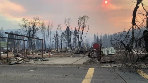 Driving through town ravaged by wildfire Stock Footage 159138582