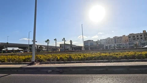 Driving Through Tree Lined Boulevards New Cairo Showing Buildings Traffic Stock Footage 329683388