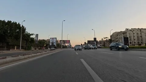Driving Through Tree Lined Boulevards New Cairo Showing Buildings Traffic Stock Footage 329790226