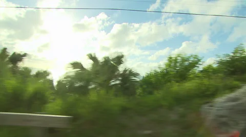Driving through Tropical Bermuda, Ocean View Stock Footage 33225375