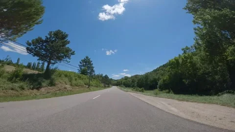 Driving through a typical landscape of Provence, France. Driver's view. Video stock 301826028