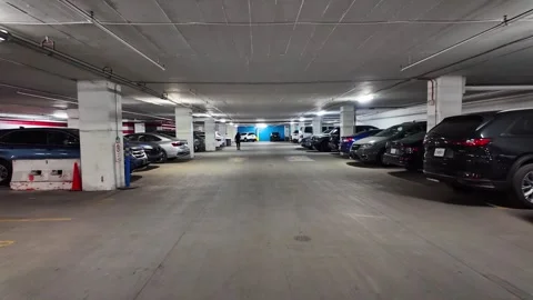 Driving through an underground parking garage in downtown Indianapolis, USA Stock Footage 344029927