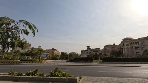 Driving Through Urban Area New Cairo Showing Roads Buildings Traffic And Stock Footage 329779575