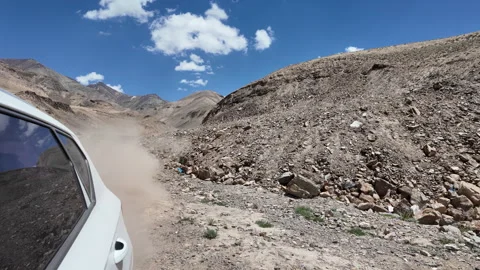 Driving Through Vast Barren Mountains in Xinjiang, China Stock Footage 339654131