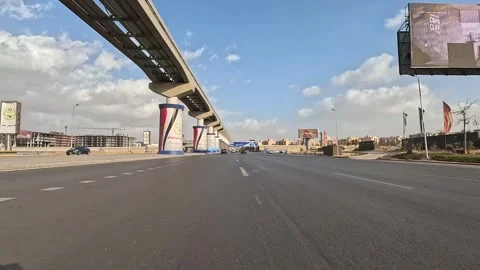 Driving Through Vibrant City District Roads New Cairo Showing Buildings Traffic Stock Footage 329656541