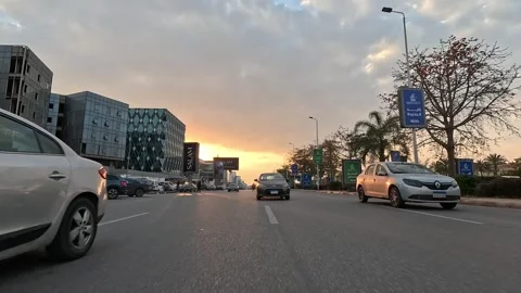 Driving Through Vibrant City District Roads New Cairo Showing Buildings Traffic Stock Footage 329895537