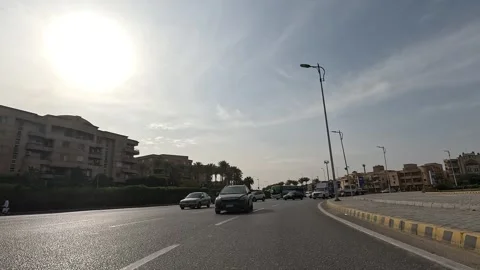 Driving Through Vibrant Streets New Cairo Showing Modern Buildings Traffic And Stock Footage 329766422
