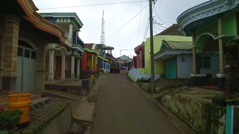 Driving through a village on Java Indonesia Stock-Footage 87489650