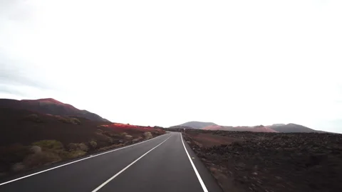 Driving through volcanic desert Stock Footage 318799934
