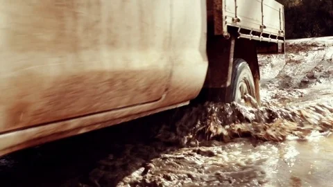 Driving through water in a 4wd Stock Footage 82519454