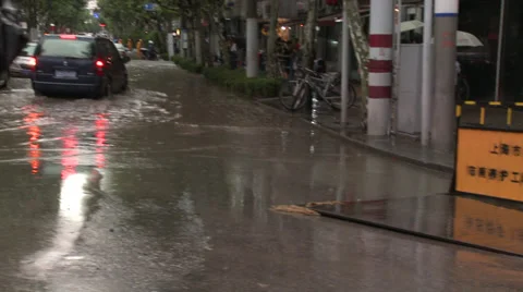 Driving through wet roads past fire engine Stock Footage 38175953