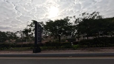 Driving Through Wide Boulevards New Cairo Showing Modern Buildings Traffic And 動画素材 329746581
