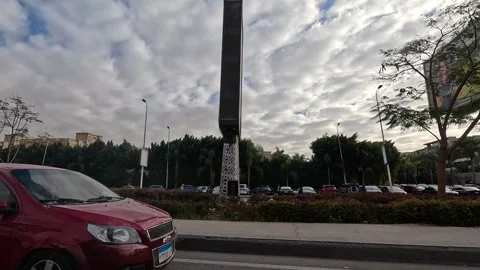 Driving Through Wide Streets New Cairo Showing Buildings Traffic Vehicles And Stock Footage 329707742
