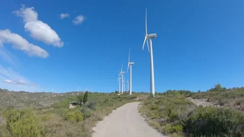 Driving through the windmills road Stock Footage 141444111