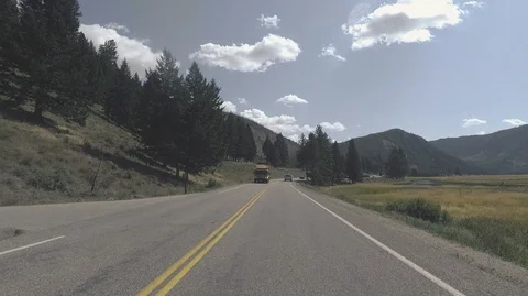 Driving through Yellowstone park, 2.7k Ultra HD Stock Footage 98574530