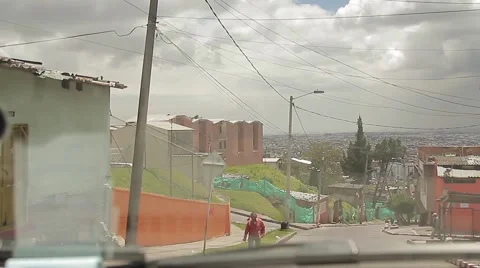 Driving thru mountainous area overlooking Bogota on a cloudy day Stock-Footage 54937902