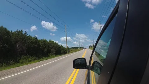 Driving thrue streets in countryside, window view Video stock 86090699