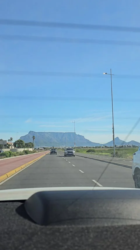 Driving toward Table Mountain, Cape Town, South Africa – Vertical 8K Video stock 347936536